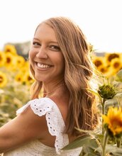 Sydney in a field of sunflowers 