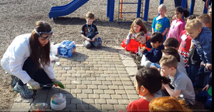 Alyana SCS Student volunteering with children