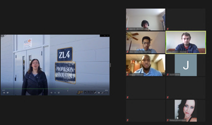 Picture of a Zoom virtual Purdue lab tour with a woman speaking infront of a lab door.