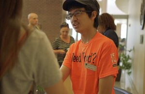 Student in housing welcoming others