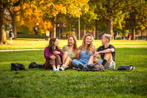 Friends on the main quad in the fall 