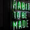 habits to be made in neon sign