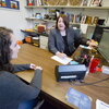 Female department of sociology student in an advising session with a female academic advisor.